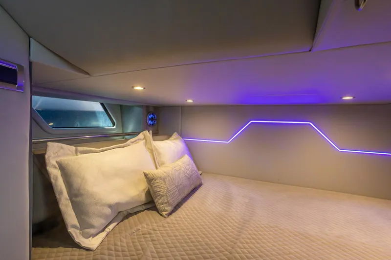 Slide: The Image of Luxurious cabin interior of 2023 Formula 430 Super Sport Crossover with ambient lighting. - 28