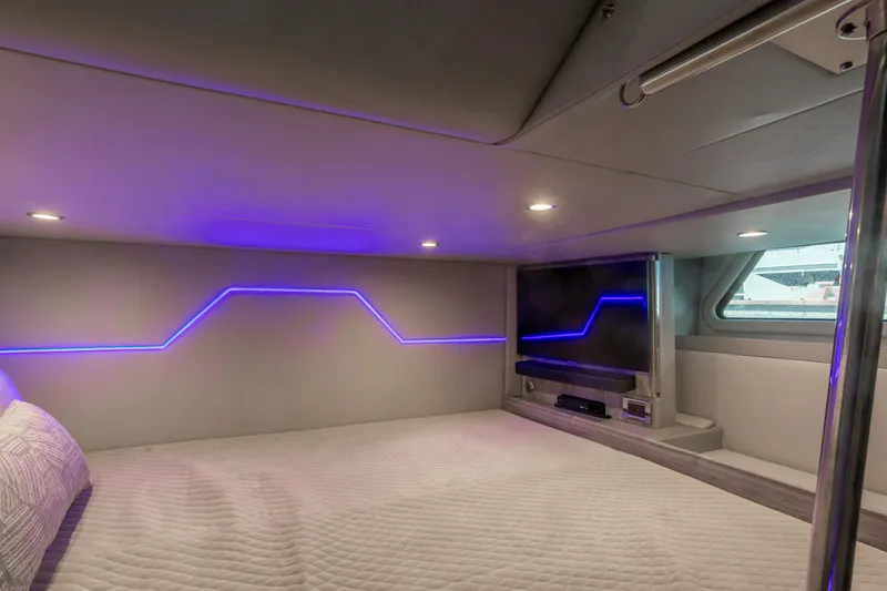 Slide: The Image of Luxurious cabin interior of 2023 Formula 430 Super Sport Crossover with ambient lighting. - 29
