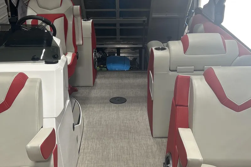 Slide: The Image of 2023 Montara 25 Surf Boss 2.0 CW interior with red and white seating. - 17