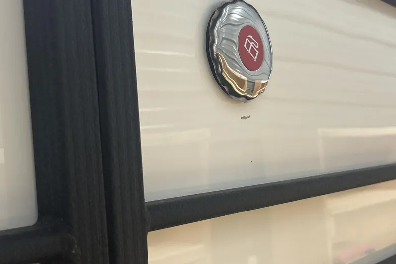 Slide: The Image of Close-up of 2023 Montara 25 Surf Boss 2.0 CW emblem on a sleek surface. - 20