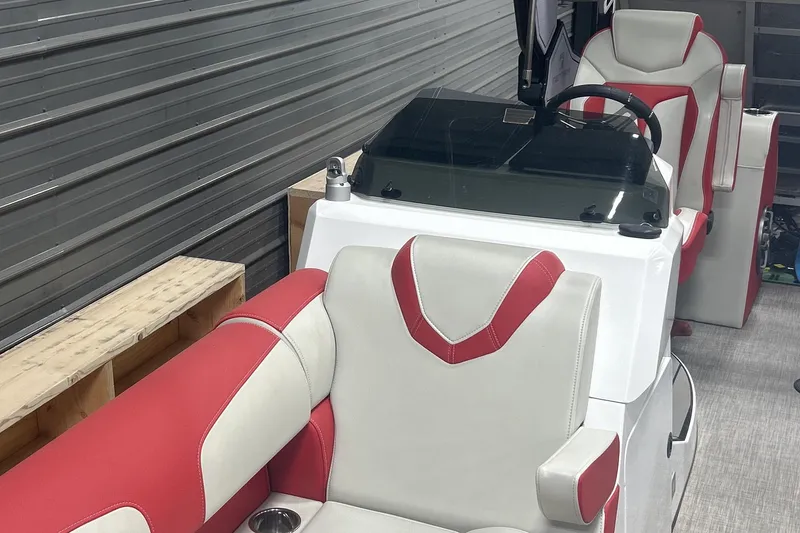 Slide: The Image of 2023 Montara 25 Surf Boss 2.0 CW boat interior with red and white seating. - 21