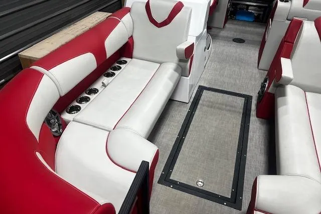 Slide: The Image of 2023 Montara 25 Surf Boss 2.0 CW boat interior with red and white seating. - 5