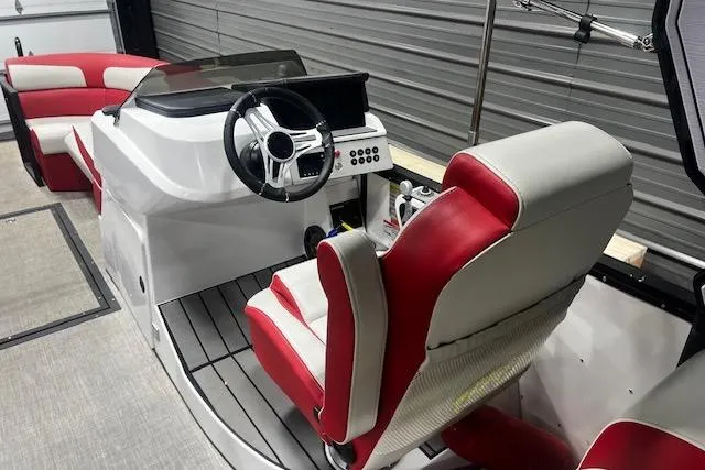 Slide: The Image of 2023 Montara 25 Surf Boss 2.0 CW boat interior with red and white seating. - 7
