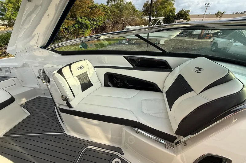 Slide: The Image of Luxurious interior of a 2019 Monterey 328SS Super Sport boat with sleek seating design. - 20