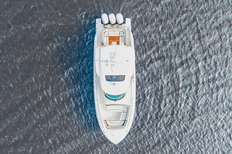 Slide: The Image of Aerial view of 2022 Tiara 38LS yacht on open water. - 1