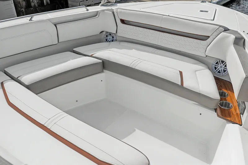 Slide: The Image of Luxurious seating area on a 2022 Tiara 38LS boat with elegant upholstery. - 10