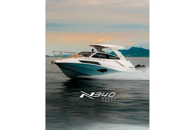 The Image of 2026 NX Boats NX340 cruising on open water at sunset. - 1