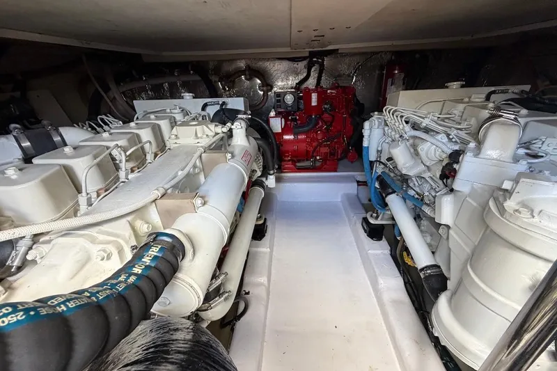 Slide: The Image of Engine room of 2005 Riviera 37 Flybridge with dual engines and generator. - 21