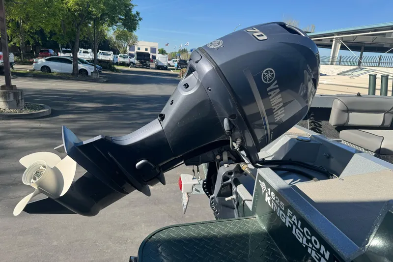 Slide: The Image of 2019 KingFisher 1625 Falcon boat with Yamaha outboard motor in parking lot. - 3