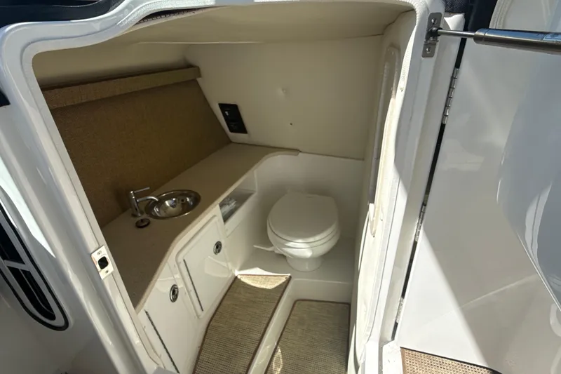 Slide: The Image of 2020 Cobalt R30 boat interior bathroom with sink and toilet. - 23