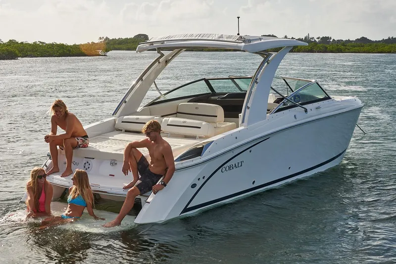 Slide: The Image of Manufacturer Provided Image: 2020 Cobalt R30 boat with people enjoying water activities. - 5