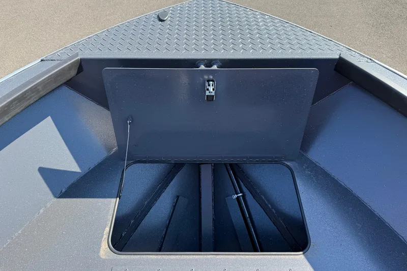 Slide: The Image of Open storage compartment on 2025 Alumaweld Adventurer 22 boat deck. - 12