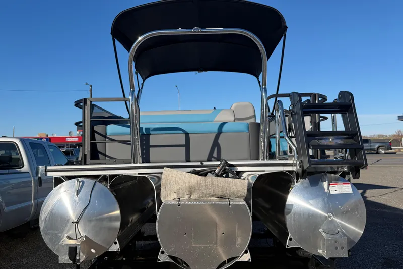Slide: The Image of 2026 Berkshire CTS Series 24UL pontoon boat, rear view with seating and ladder. - 18