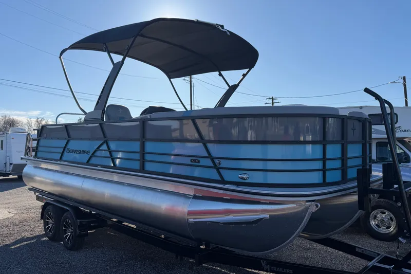 Slide: The Image of 2026 Berkshire CTS Series 24UL pontoon boat with canopy on trailer. - 6