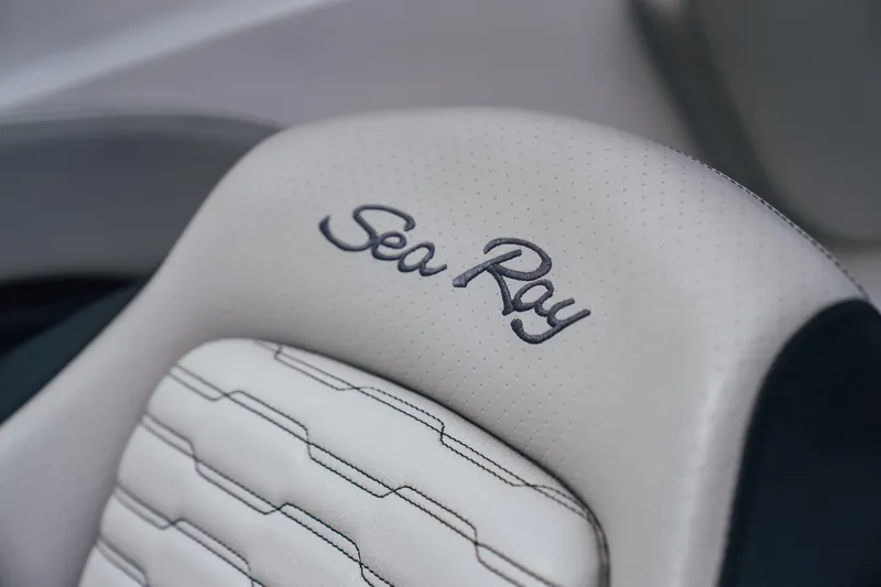 Slide: The Image of Sea Ray SPX 230 2023 boat seat with embroidered logo detail. - 11