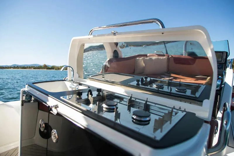 Slide: The Image of Manufacturer Provided Image: Zodiac Medline 9 boat kitchen, 2026 model, on open water. - 5