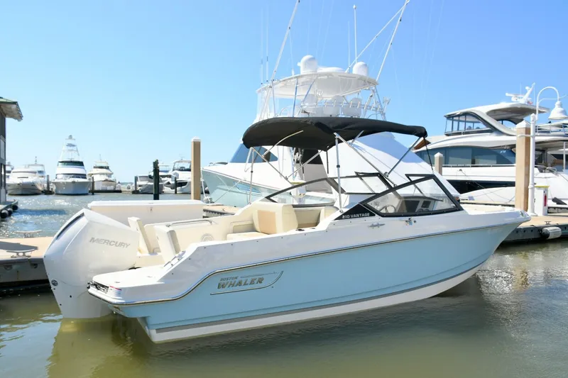 The Image of 2024 Boston Whaler 210 Vantage boat docked at marina. - 0