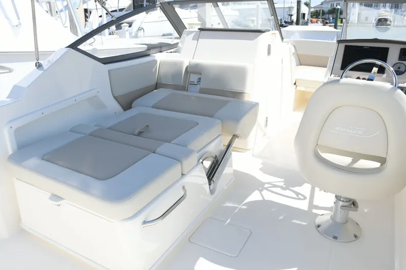 Slide: The Image of Interior of 2024 Boston Whaler 210 Vantage with luxurious seating. - 11