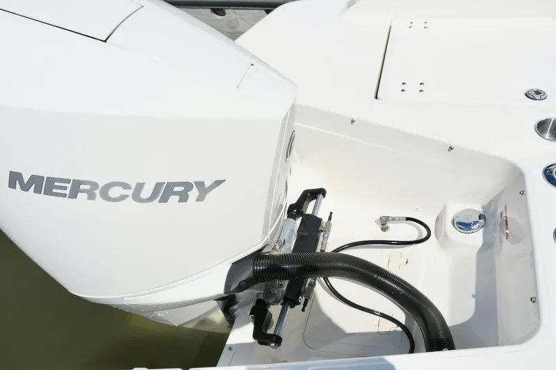 Slide: The Image of 2024 Boston Whaler 210 Vantage with Mercury engine, detailed view. - 21