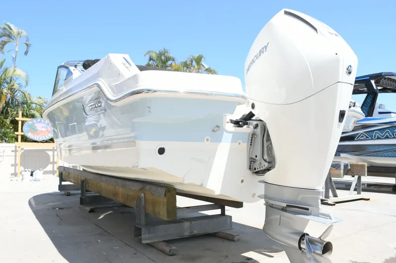 Slide: The Image of 2024 Boston Whaler 210 Vantage boat with Mercury outboard motor. - 25