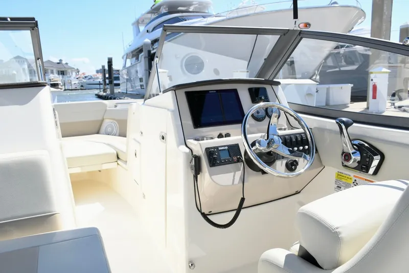 Slide: The Image of Interior view of the 2024 Boston Whaler 210 Vantage boat. - 8
