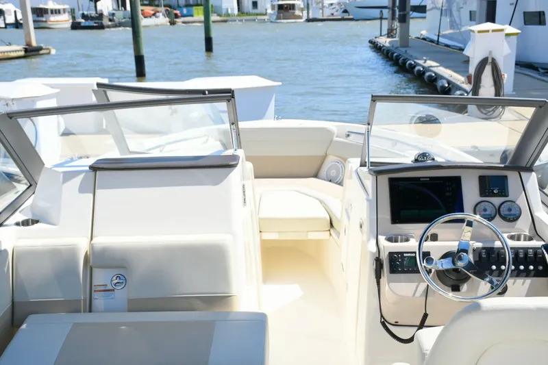 Slide: The Image of Interior of 2024 Boston Whaler 210 Vantage with helm console. - 9