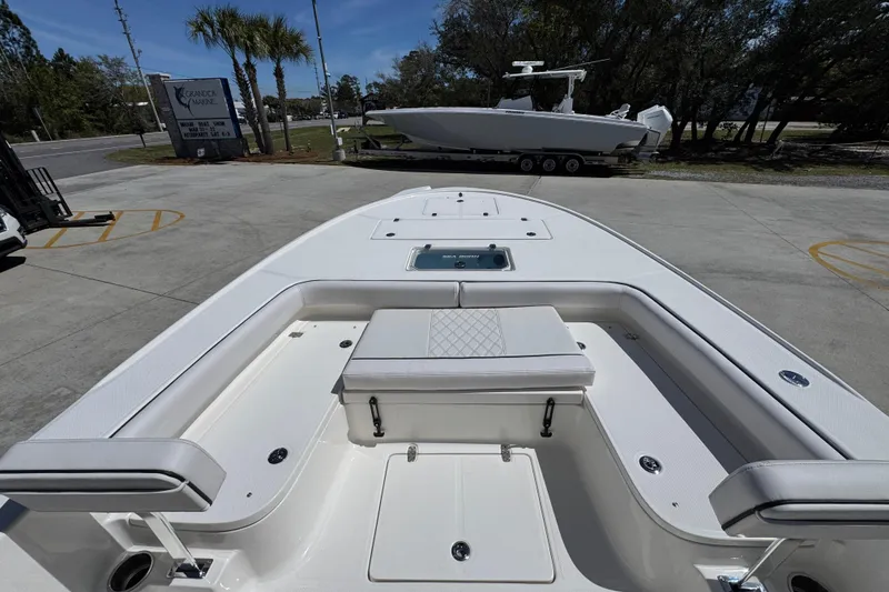 Slide: The Image of 2026 Sea Born FX25 Bay boat with spacious seating and sleek design. - 17