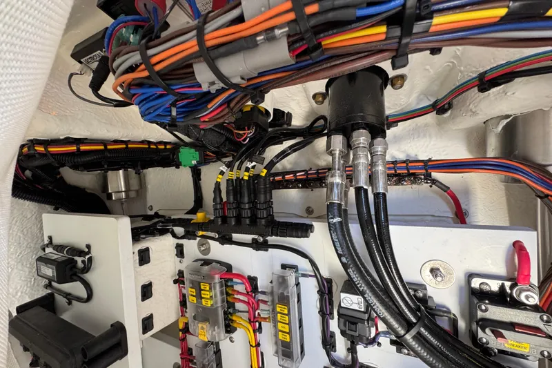 Slide: The Image of Electrical wiring system inside a 2026 Sea Born FX25 Bay boat. - 26