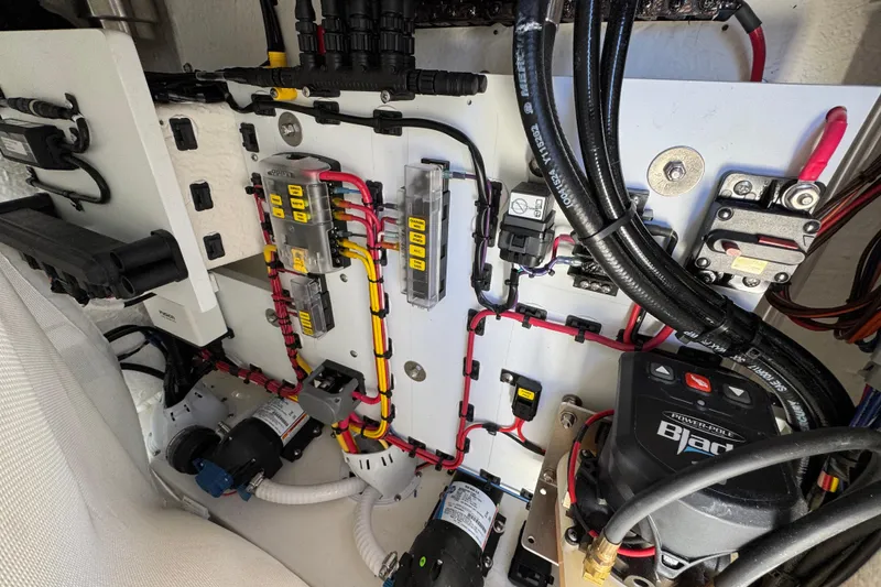 Slide: The Image of Electrical system of a 2026 Sea Born FX25 Bay boat, showcasing wiring and components. - 27