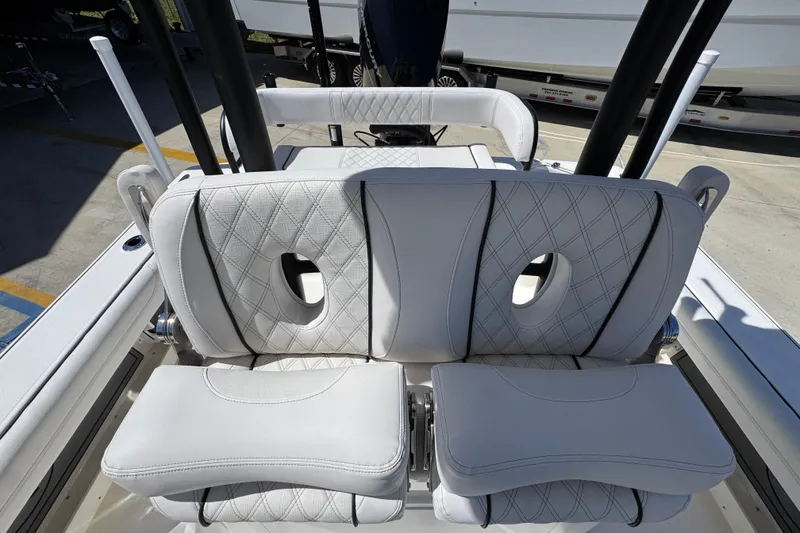 Slide: The Image of 2026 Sea Born FX25 Bay boat with luxurious white seating and diamond stitching. - 29