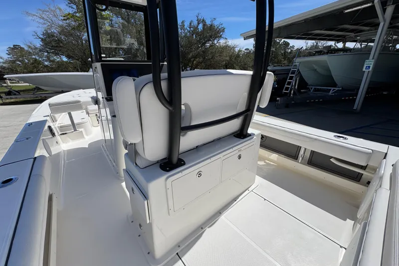 Slide: The Image of 2026 Sea Born FX25 Bay boat interior with seating and storage compartments. - 38
