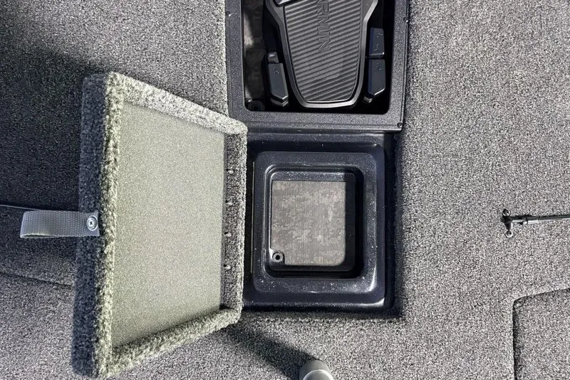 Slide: The Image of Open storage compartment on 2026 Nitro Z19 XL Pro boat deck. - 12