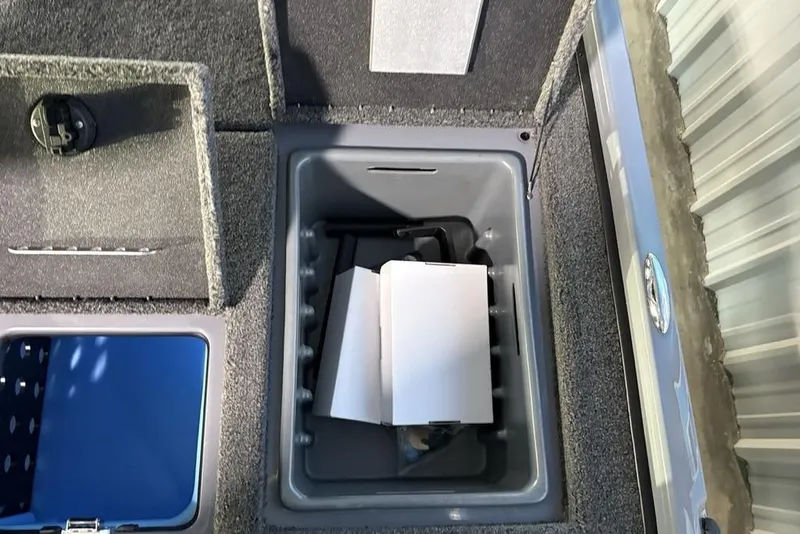 Slide: The Image of Storage compartment in 2026 Nitro Z19 XL Pro boat, featuring organized interior space. - 27