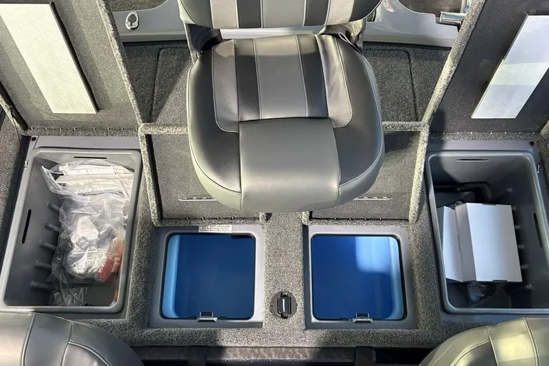 Slide: The Image of Interior of 2026 Nitro Z19 XL Pro boat with storage compartments and seating. - 29