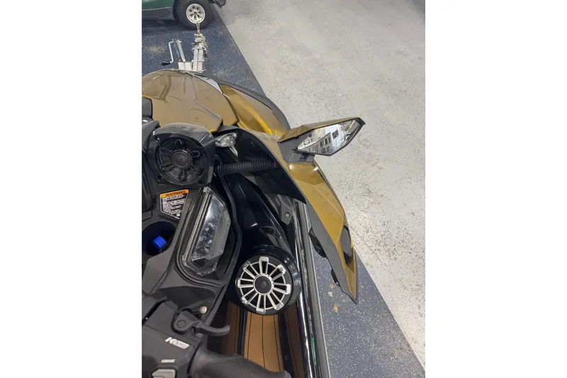 Slide: The Image of 2023 Kawasaki Ultra LX jet ski dashboard and controls in a showroom. - 15