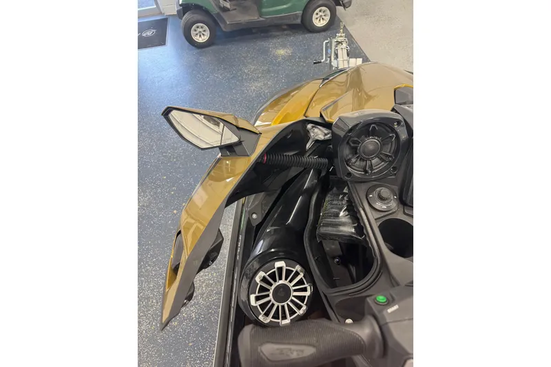 Slide: The Image of 2023 Kawasaki Ultra LX jet ski dashboard with speakers and controls. - 17