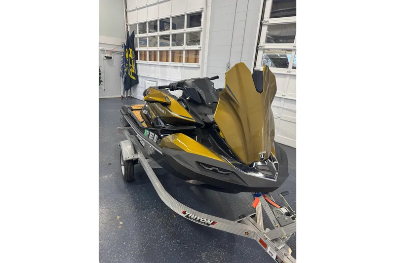 Slide: The Image of 2023 Kawasaki Ultra LX jet ski in a showroom on a trailer. - 19