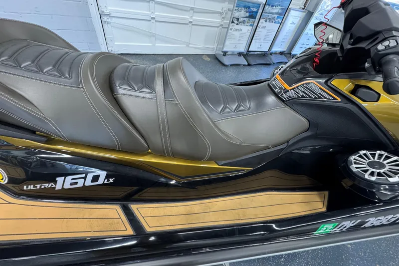 Slide: The Image of 2023 Kawasaki Ultra LX jet ski with sleek design and comfortable seating. - 9