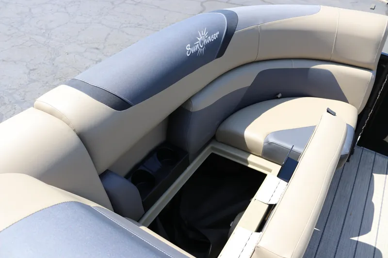 Slide: The Image of 2025 SunChaser Geneva Sport 23 LR PSB boat seating with storage compartment. - 18