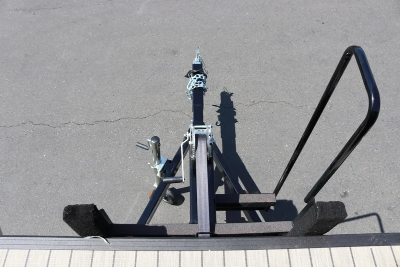 Slide: The Image of Trailer hitch of 2025 SunChaser Geneva Sport 23 LR PSB on pavement. - 20