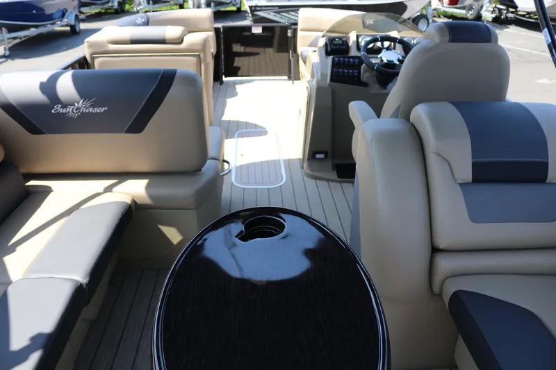 Slide: The Image of Interior of 2025 SunChaser Geneva Sport 23 LR PSB pontoon boat with luxurious seating. - 21