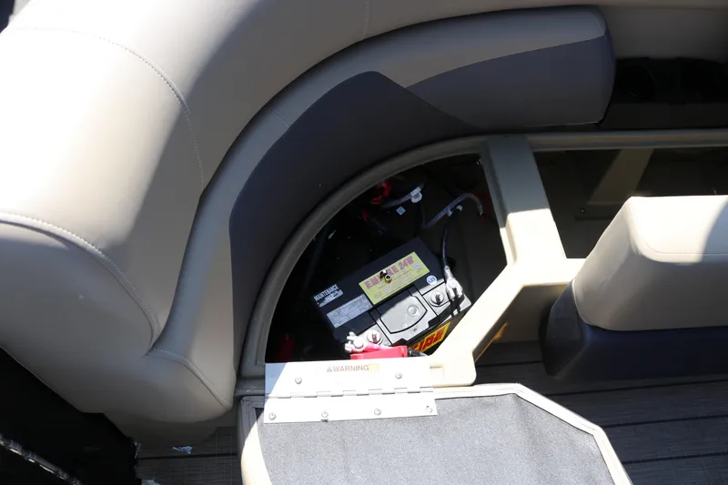Slide: The Image of Battery compartment of 2025 SunChaser Geneva Sport 23 LR PSB pontoon boat. - 29