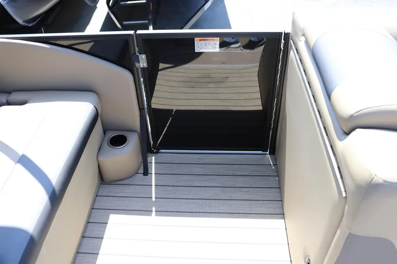 Slide: The Image of Interior of 2025 SunChaser Geneva Sport 23 LR PSB pontoon boat, featuring seating and flooring. - 33