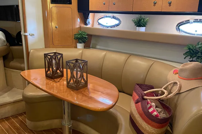 Slide: The Image of Interior of 2006 Chaparral Signature 350 yacht with cozy seating and elegant decor. - 14