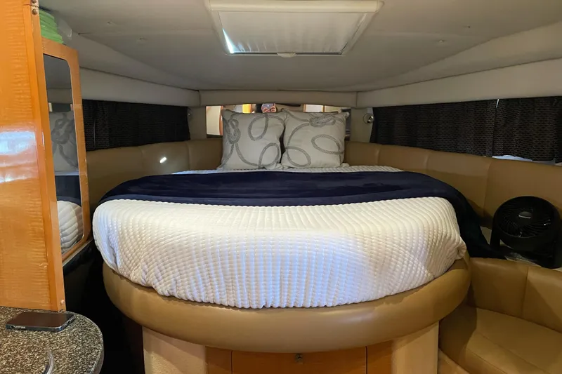 Slide: The Image of Interior cabin of 2006 Chaparral Signature 350 with cozy bed and modern decor. - 16