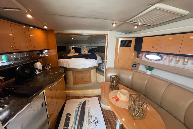 Slide: The Image of Luxurious interior of 2006 Chaparral Signature 350 yacht with cozy seating and modern amenities. - 17