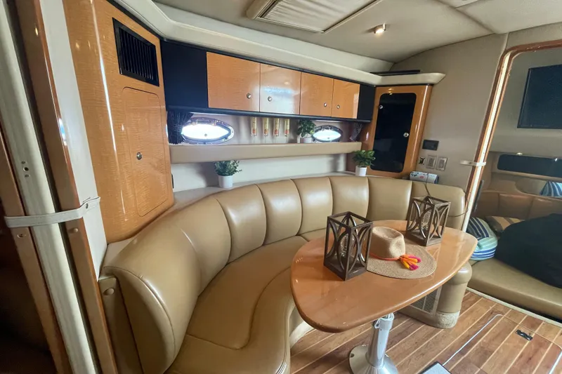 Slide: The Image of Luxurious 2006 Chaparral Signature 350 yacht interior with leather seating and elegant decor. - 19