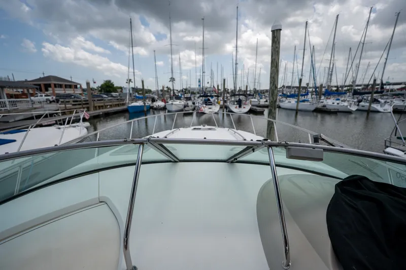 Slide: The Image of View from a 2006 Chaparral Signature 350 boat in a marina with sailboats. - 9