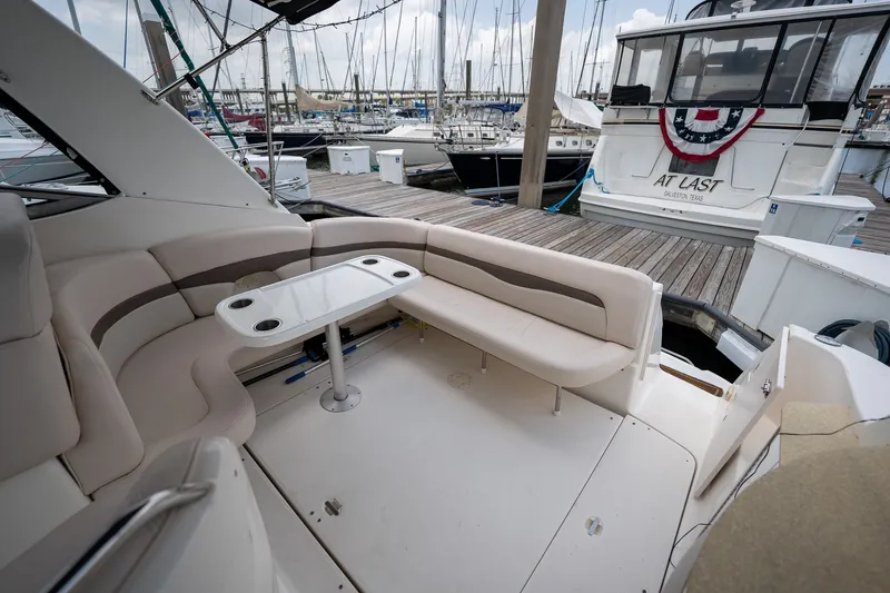 Slide: The Image of 2006 Chaparral Signature 350 yacht interior with seating and table at marina. - 5