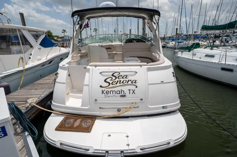 Slide: The Image of 2006 Chaparral Signature 350 boat docked in Kemah, TX marina. - 4